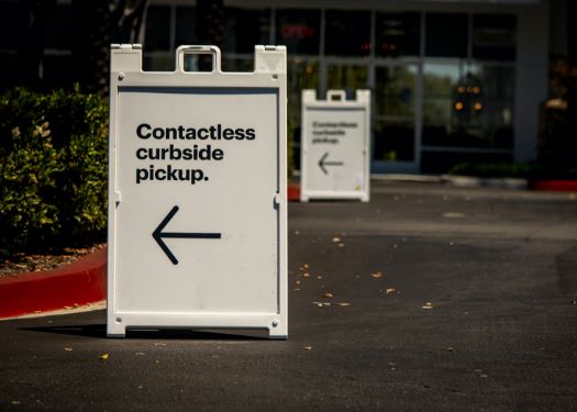 Contacless curbside pickup sign